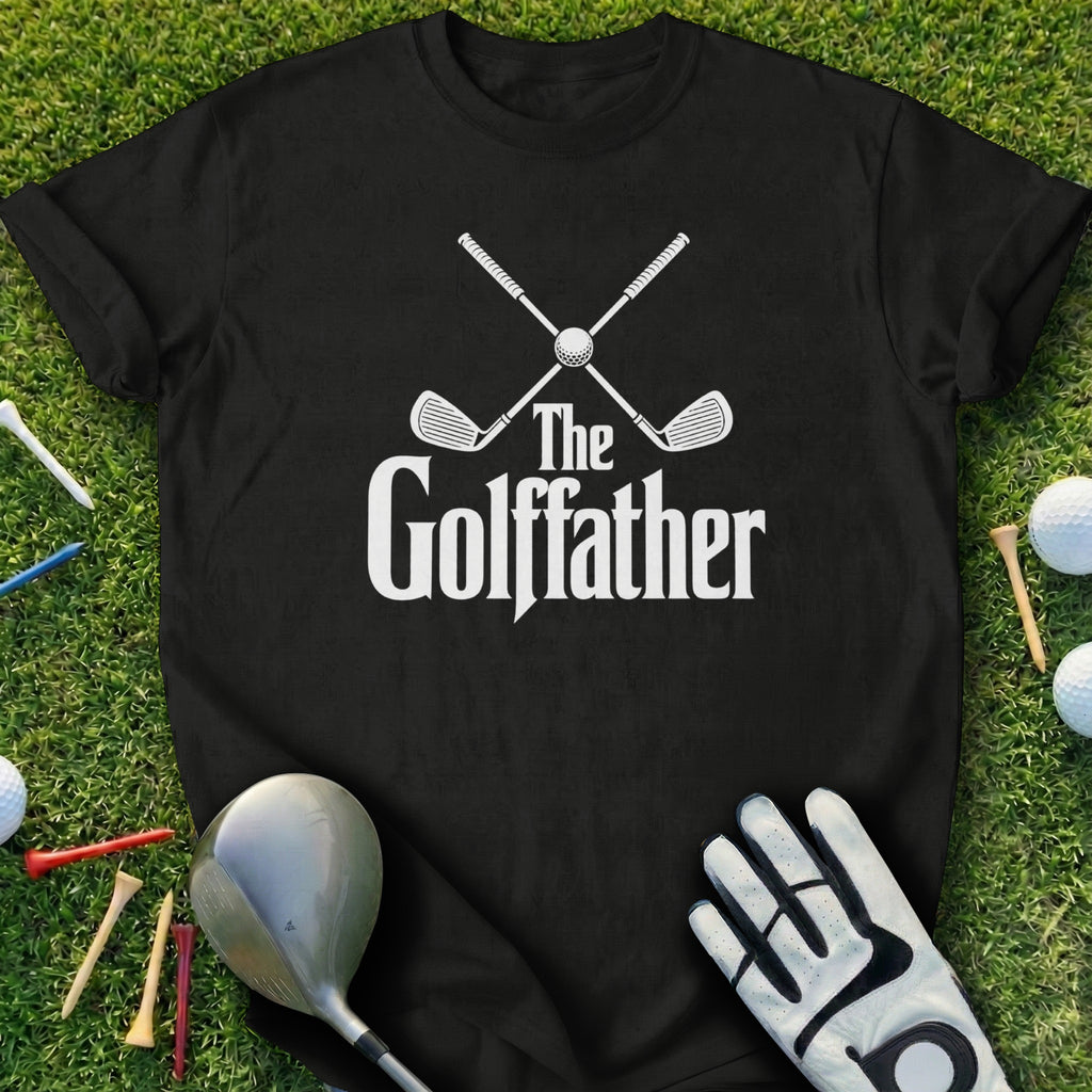 Black t-shirt with "The Golfather" text and crossed golf clubs on grass.