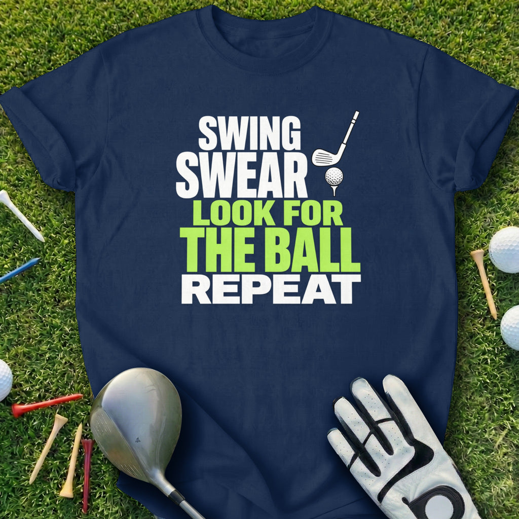 Navy t-shirt with "Swing Swear Look for the Ball Repeat" text and golf accessories.
