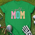 Green t-shirt with "golf MOM" text in leopard and cheetah print.