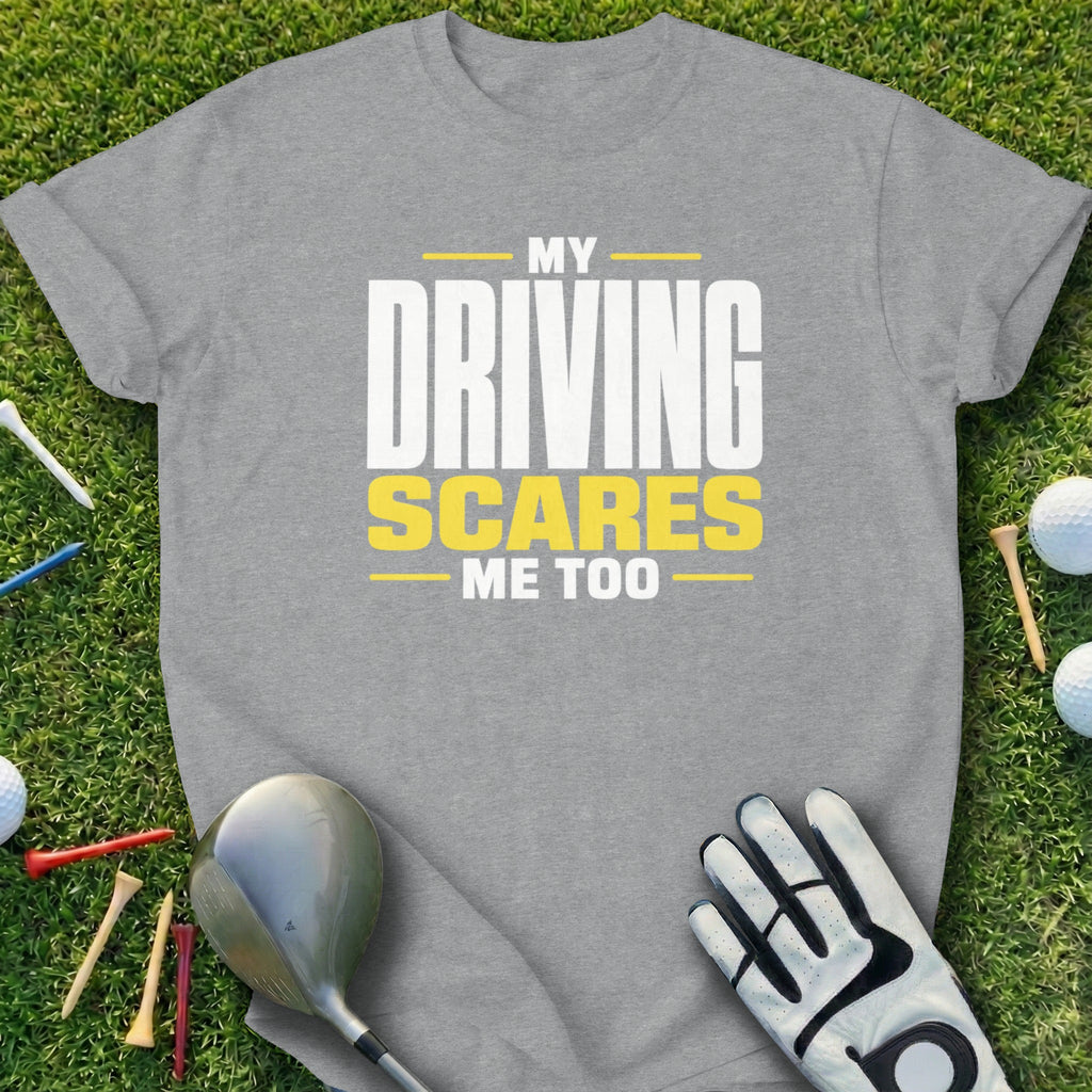 Grey t-shirt with "My Driving Scares Me Too" text, golf club, glove, and tees.