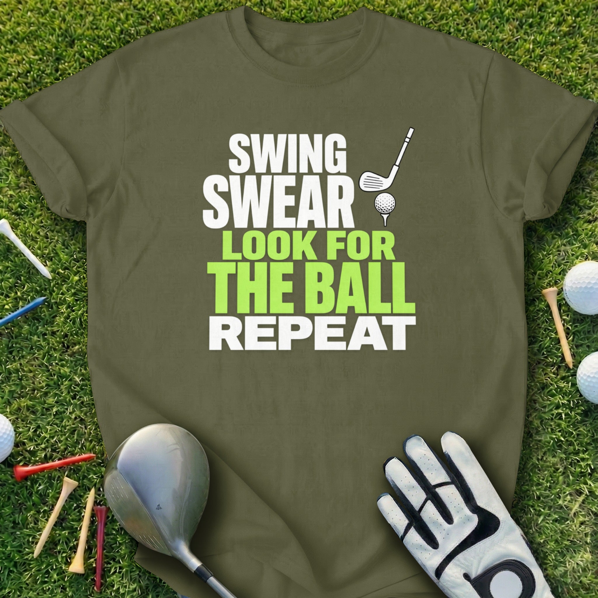 Olive green t-shirt with "Swing Swear Look for the Ball Repeat" text and golf graphics.