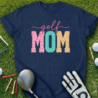 Navy t-shirt with "golf MOM" text in leopard print and argyle patterns.