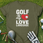 Olive green t-shirt with "GOLF -is- my LOVE LANGUAGE" text, cracked heart, and golf ball.