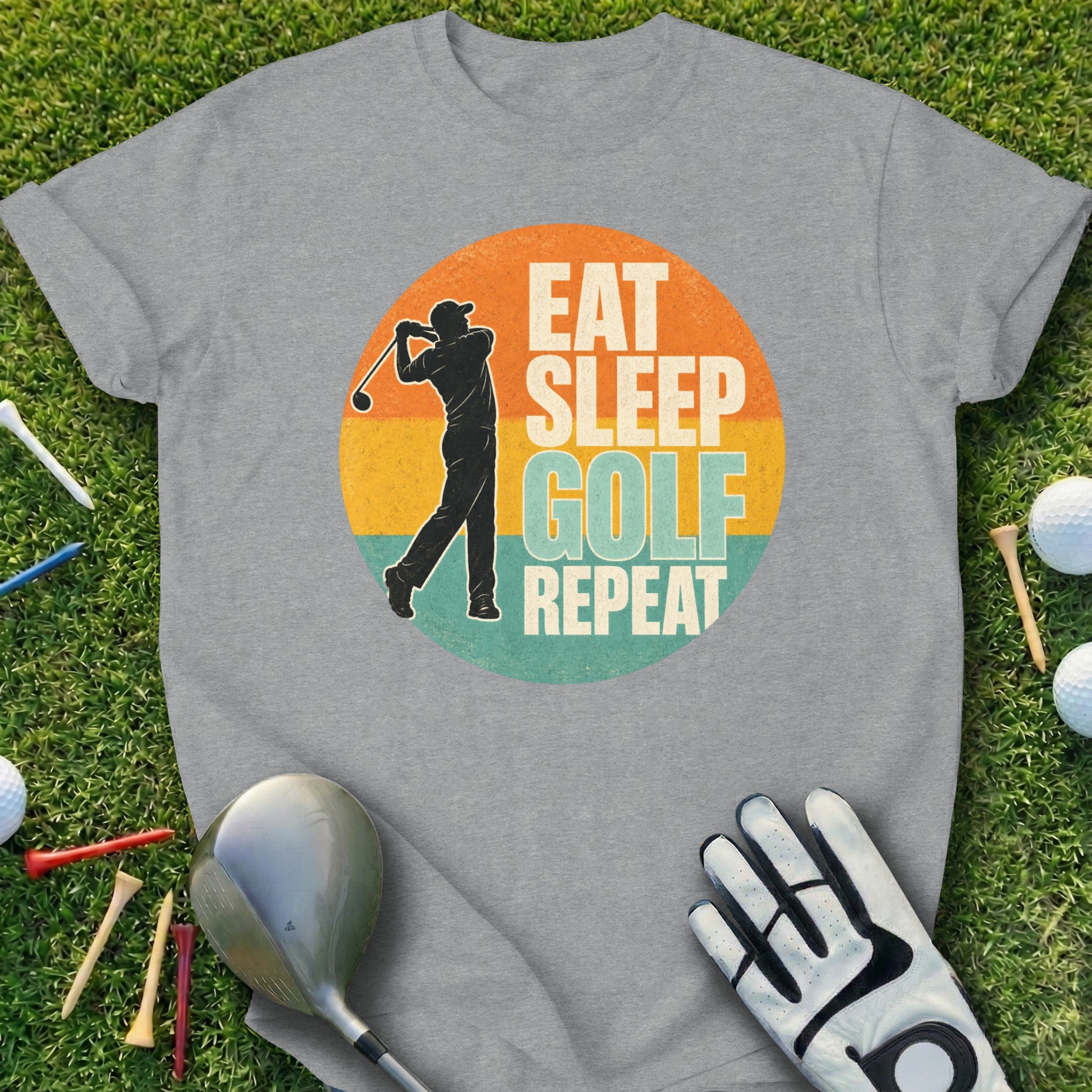 Grey t-shirt with "Eat Sleep Golf Repeat" text and golfer graphic.