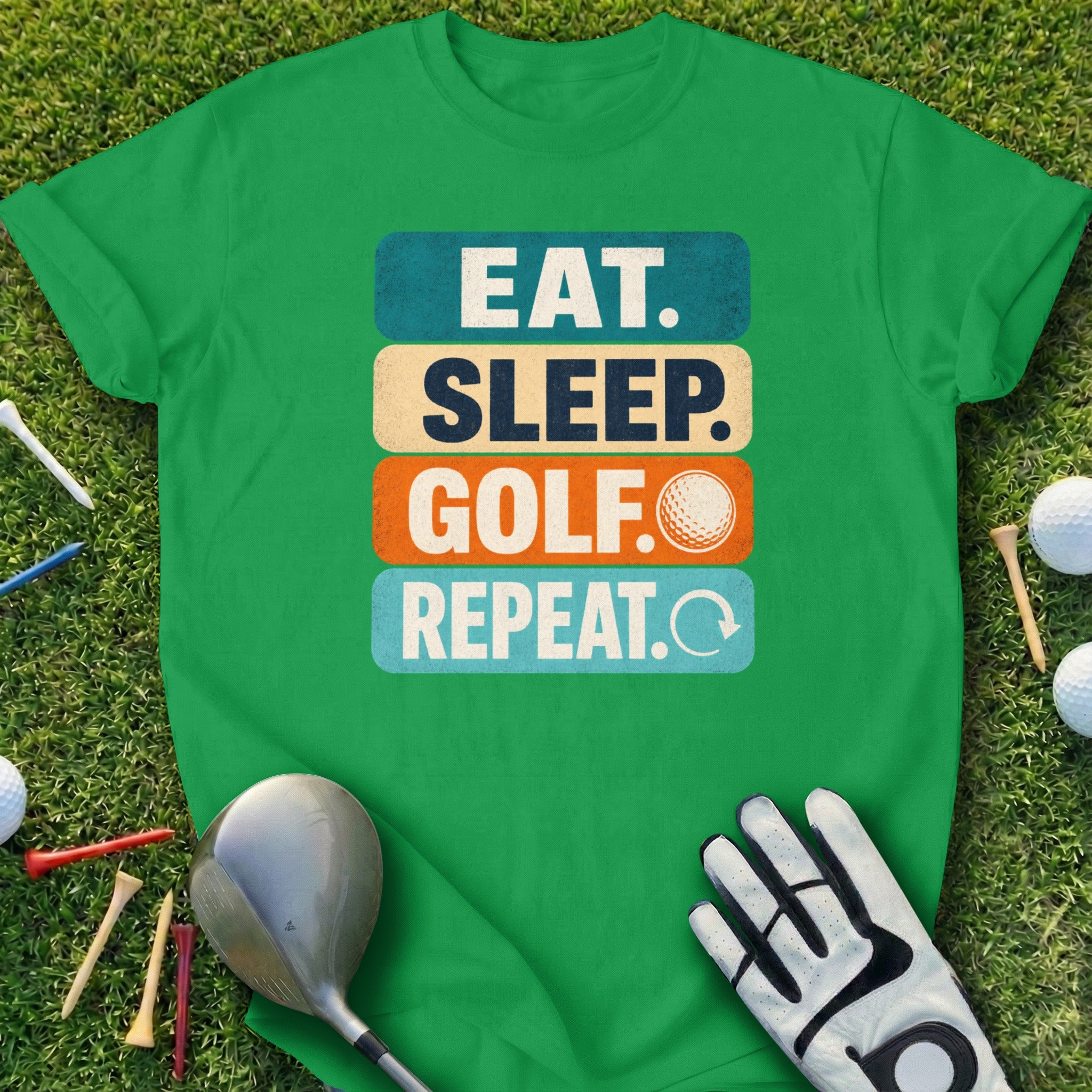 Green t-shirt with "EAT. SLEEP. GOLF. REPEAT." text and golf ball graphic.