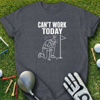 Dark t-shirt with graphic of golfer kneeling, holding head, with text "Can't Work Today".