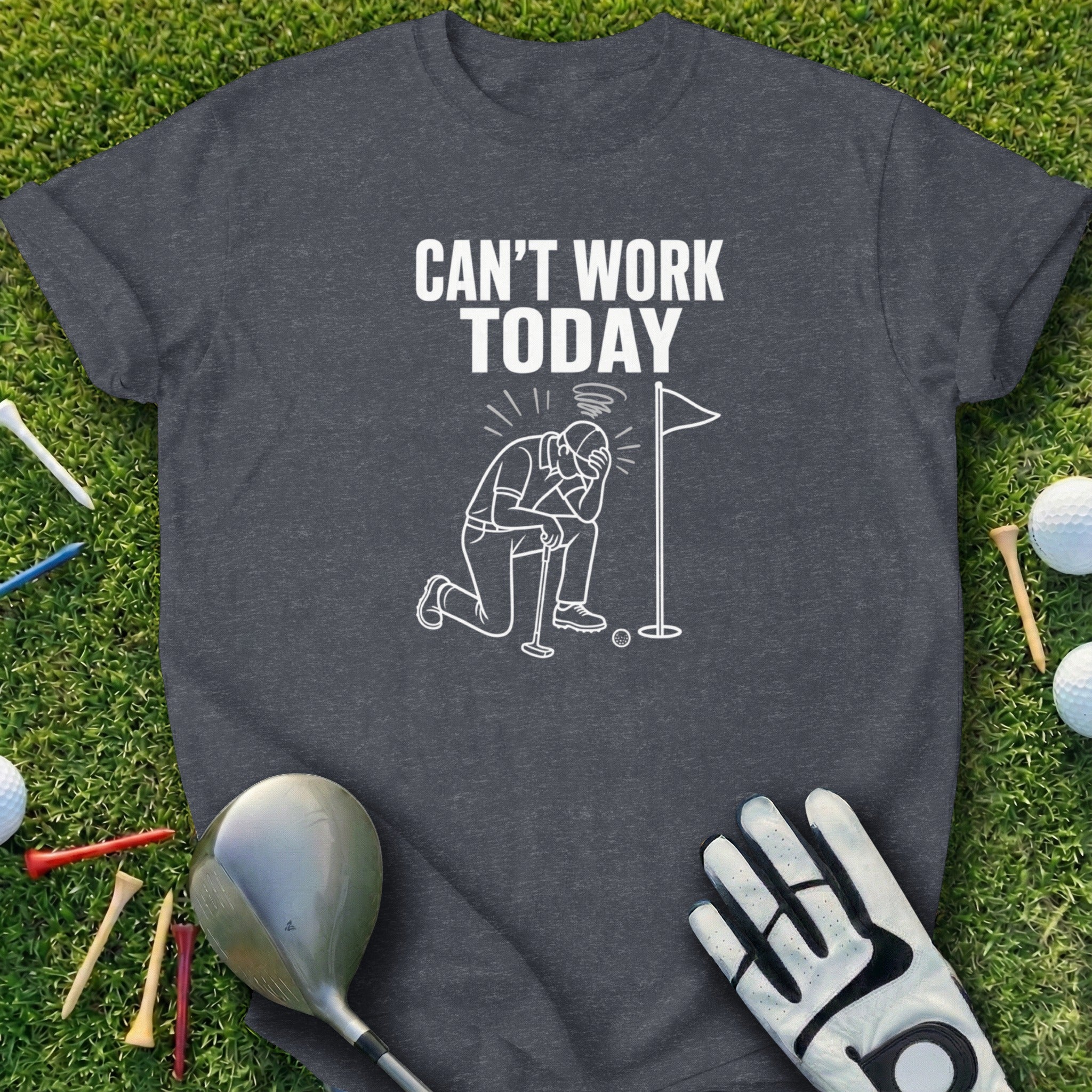 Dark t-shirt with graphic of golfer kneeling, holding head, with text "Can't Work Today".