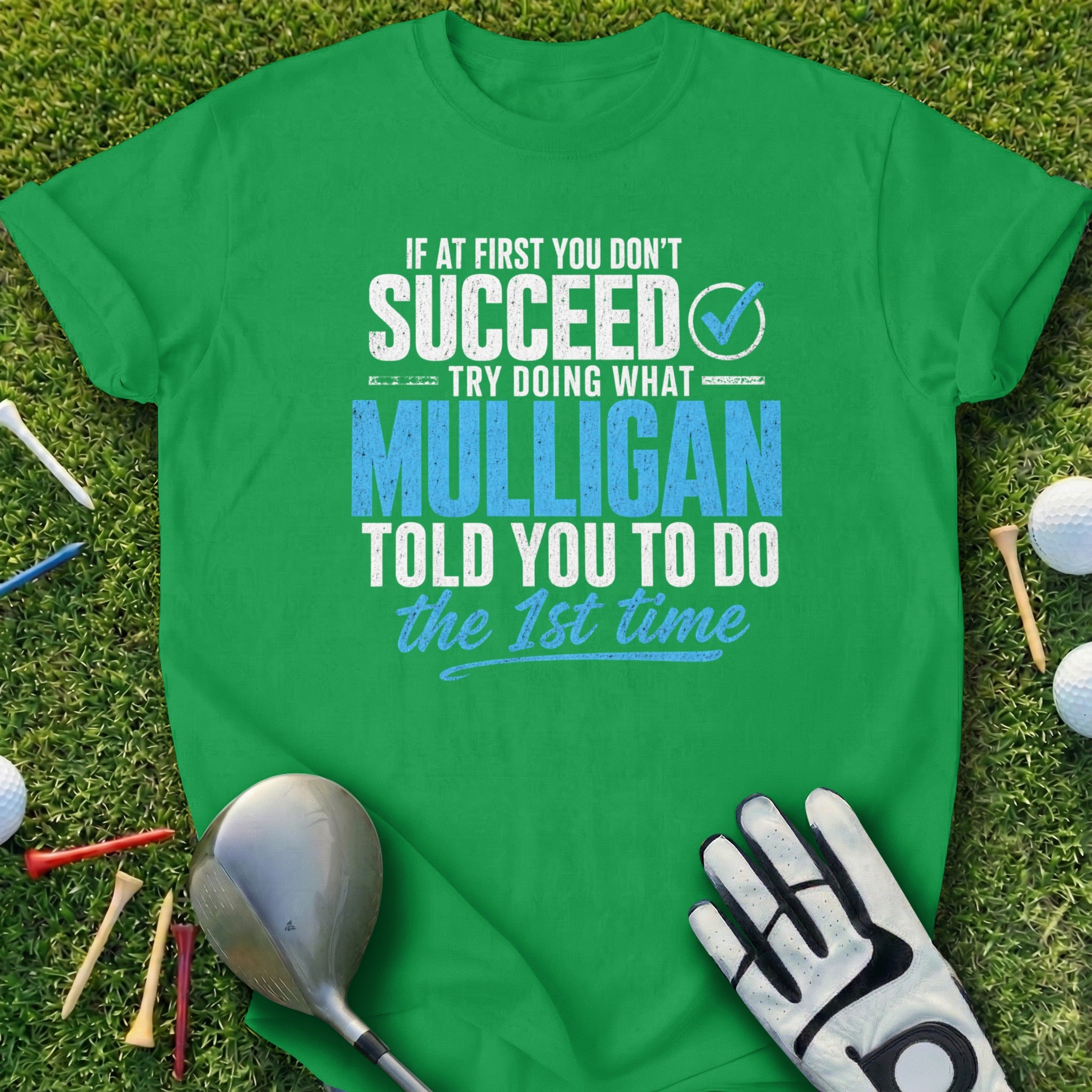 Green t-shirt with white text about succeeding in golf.