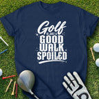 Navy t-shirt with "Golf is Just a Good Walk Spoiled" text on grass.