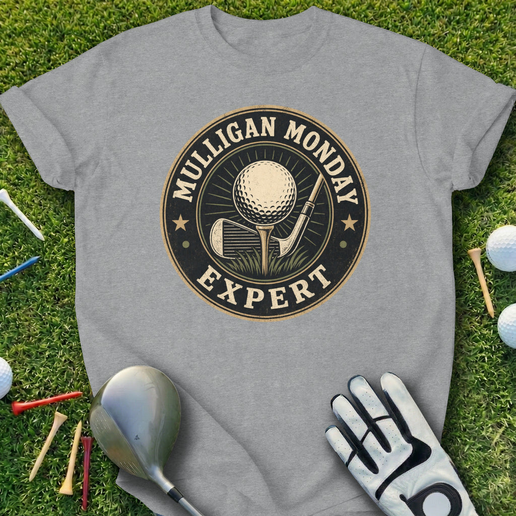 T-shirt with "Mulligan Monday Expert" text and golf club, ball, and tee graphic.