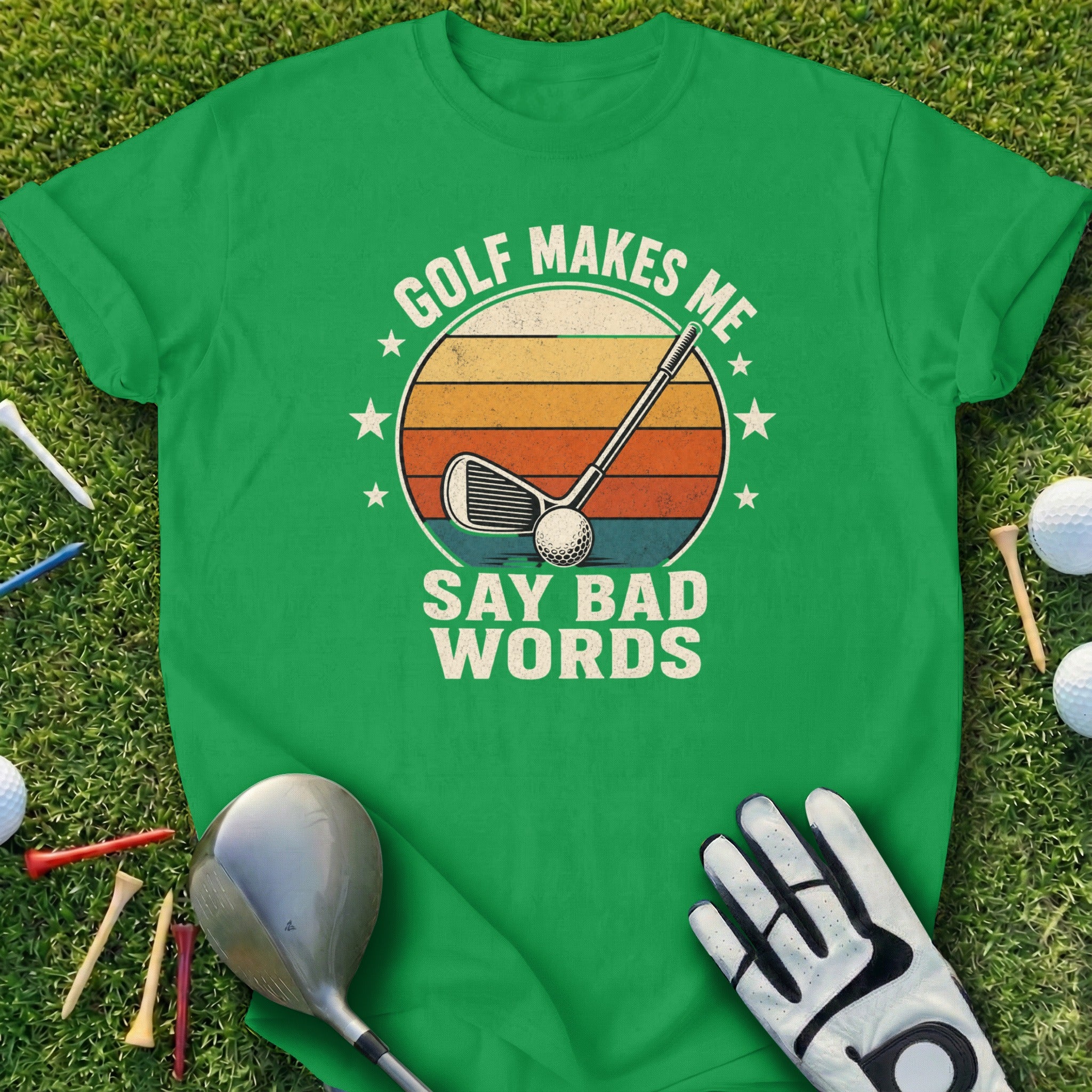 Green t-shirt with "Golf Makes Me Say Bad Words" slogan and golf club graphic.