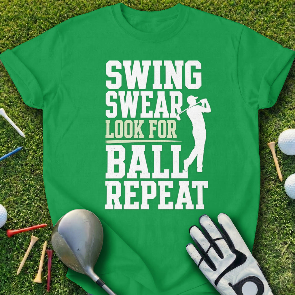 Green t-shirt with "Swing Swear Look For Ball Repeat" text and golfer silhouette.