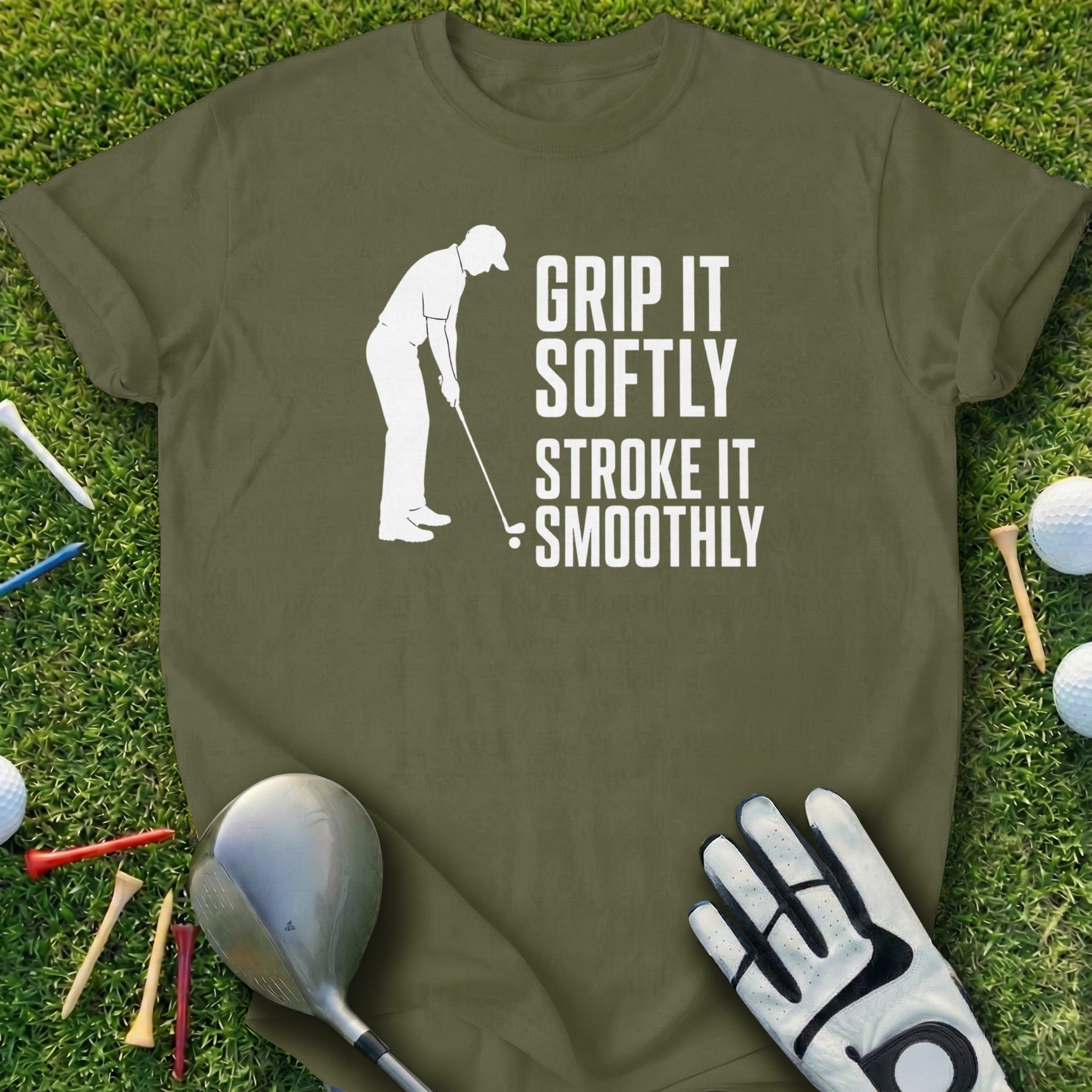 T-shirt with white text "Grip it softly, stroke it smoothly" above a golfer silhouette.