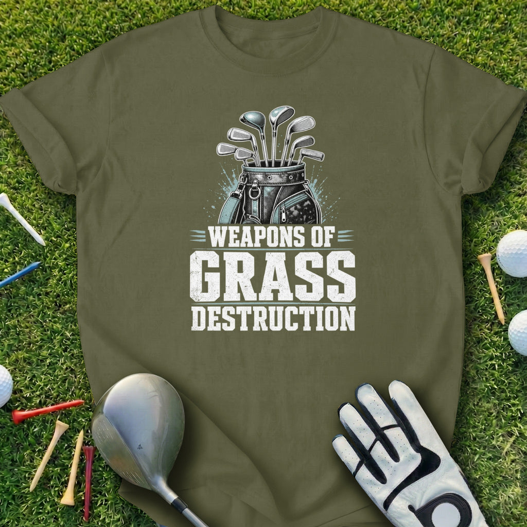 Green t-shirt with "WEAPONS OF GRASS DESTRUCTION" golf club graphic.