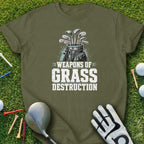 Green t-shirt with "WEAPONS OF GRASS DESTRUCTION" golf club graphic.