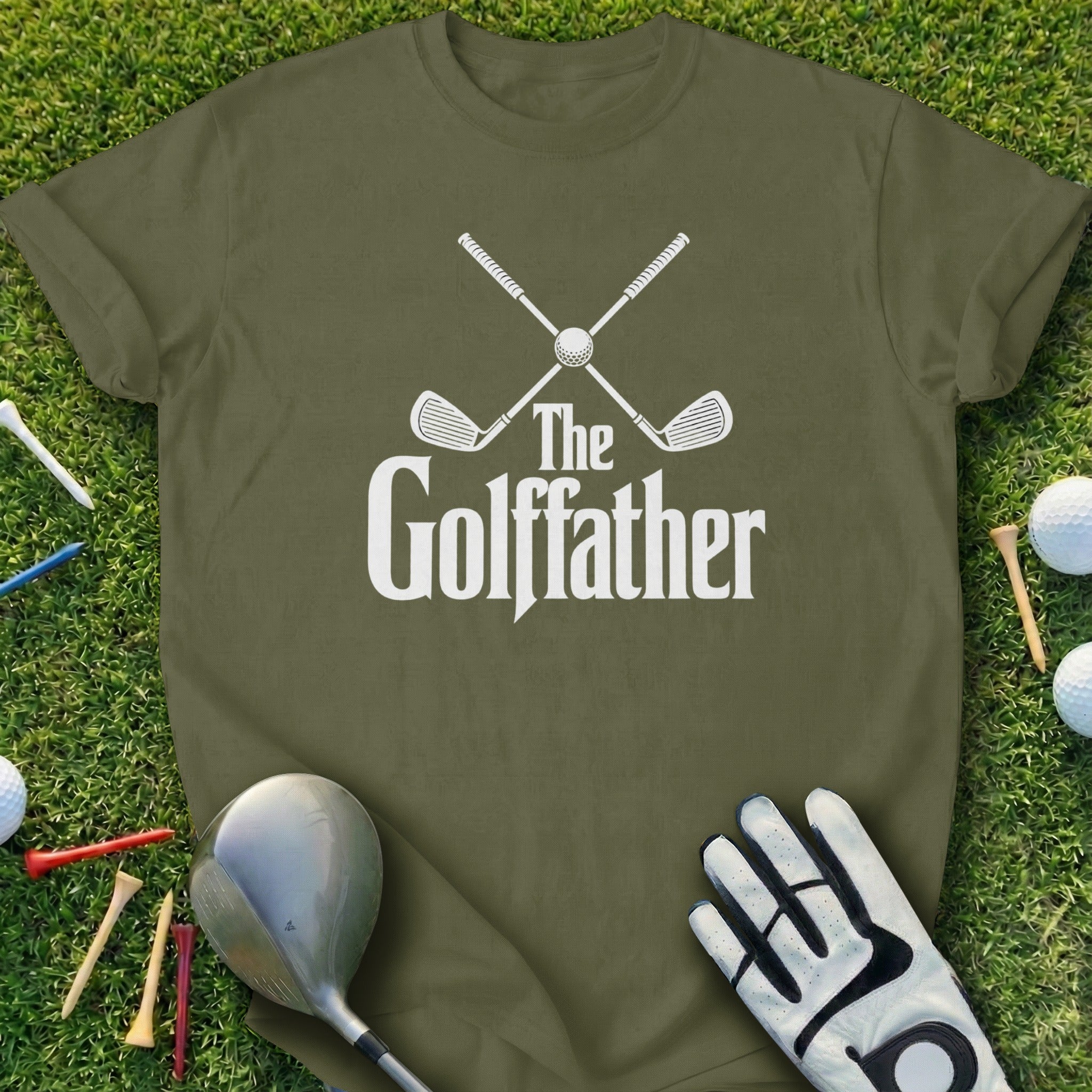 Green t-shirt with "The Golffather" and crossed golf clubs design.