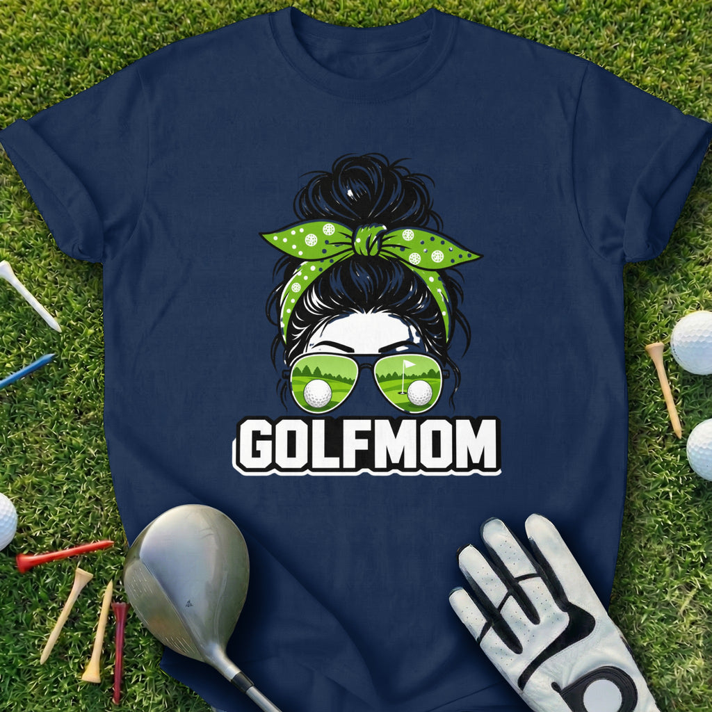 Navy t-shirt with "GOLFMOM" text and sunglasses with golf ball reflections.