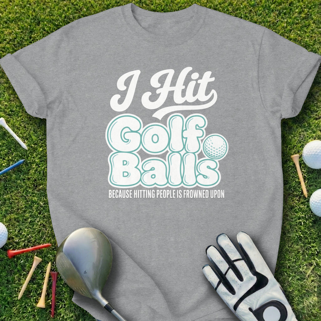 Gray t-shirt with "I Hit Golf Balls" text and golf accessories.