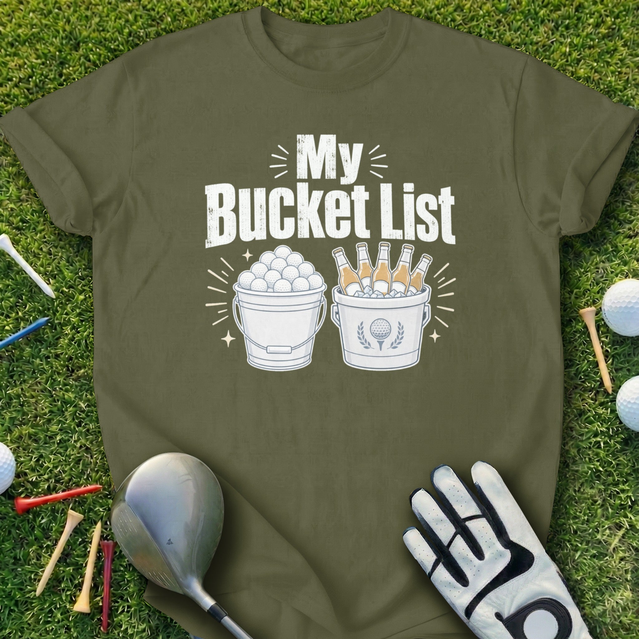 Bucket list graphic on olive green t-shirt with golf clubs and balls.