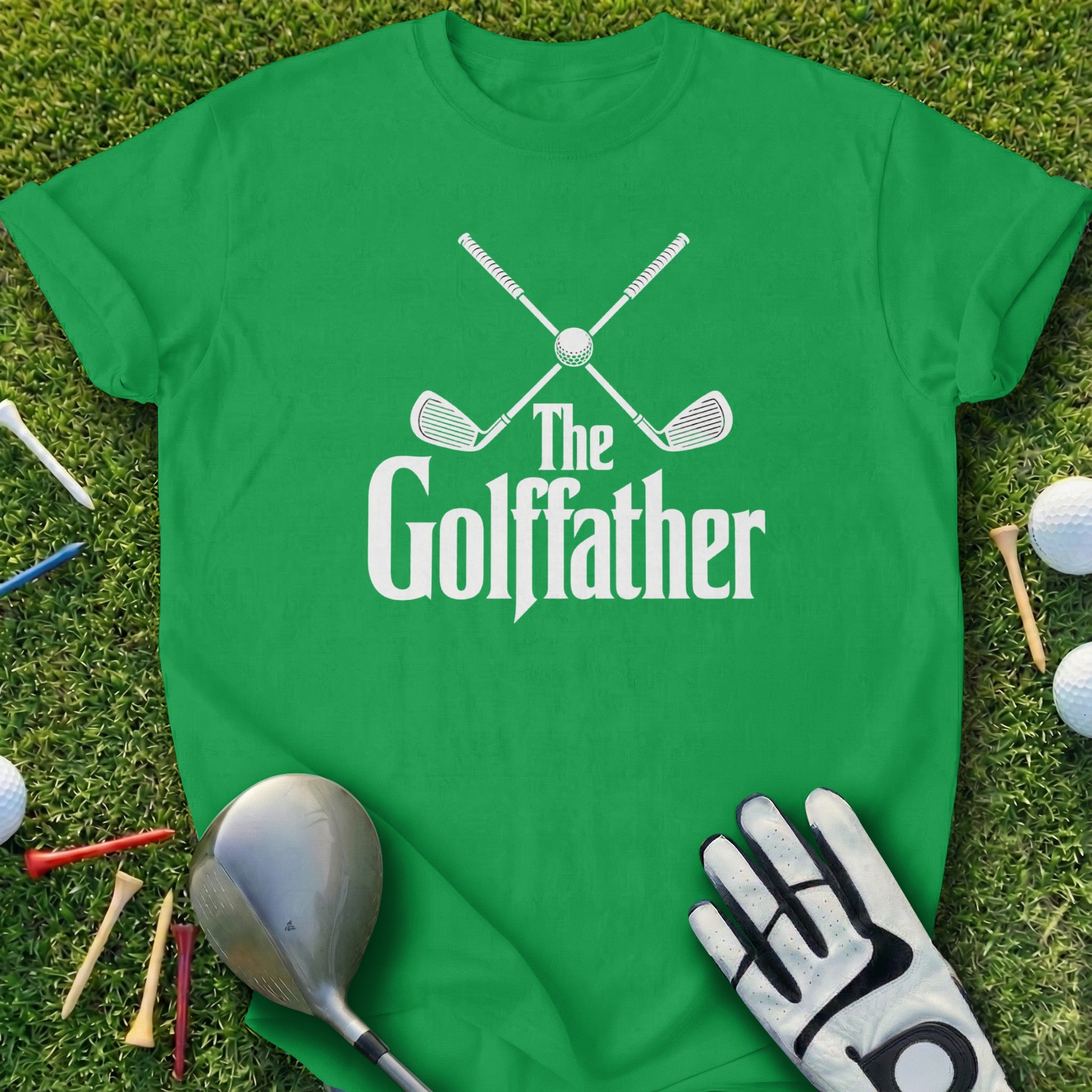 Green t-shirt with "The Golffather" logo and golf accessories.