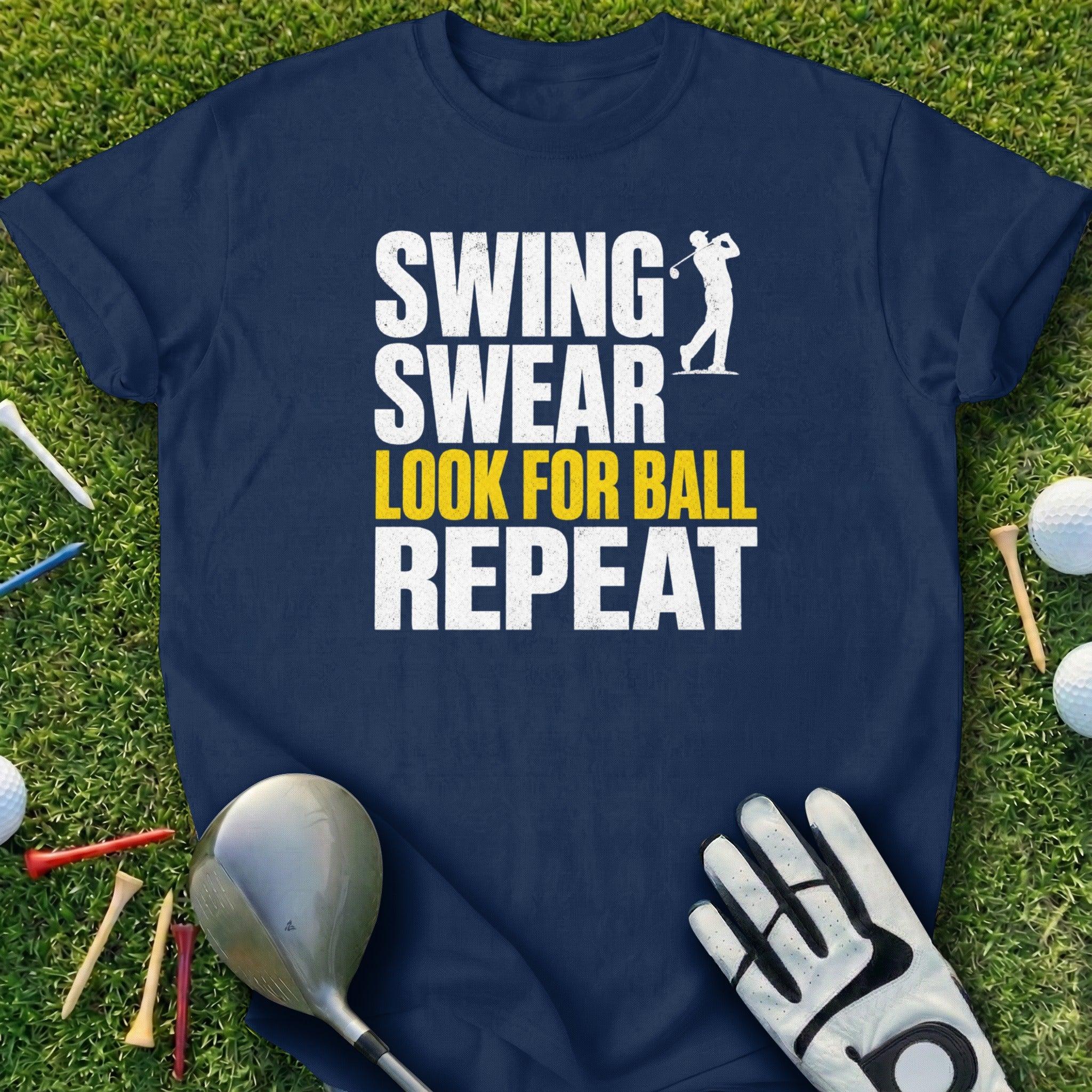 Navy t-shirt with "Swing Swear Look for Ball Repeat" in white and yellow text.