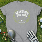Gray t-shirt with "Abandoned Golf Wives Social Club" text and golf graphics.