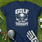 Navy t-shirt with "GOLF IS MY THERAPY" text and crossed golf clubs and ball.