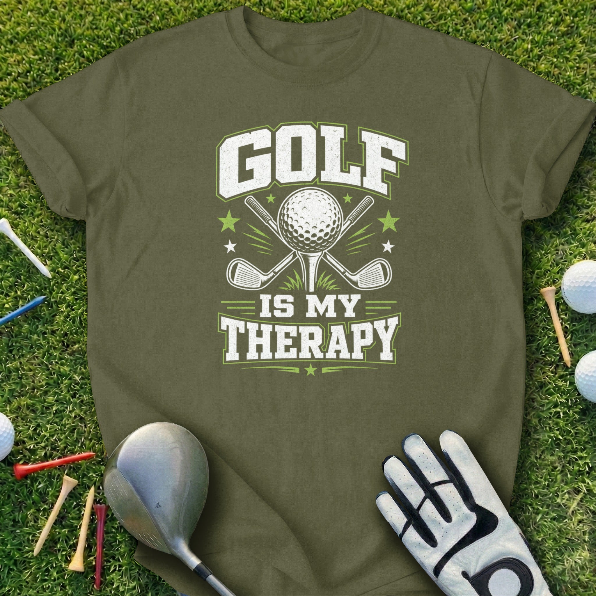 Green t-shirt with "Golf is my therapy" text, golf ball, and crossed clubs.