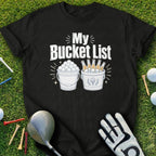 Black t-shirt with "My Bucket List" text and graphic of golf balls and beer bottles.