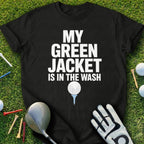 Black t-shirt with "MY GREEN JACKET IS IN THE WASH" text and golf accessories.