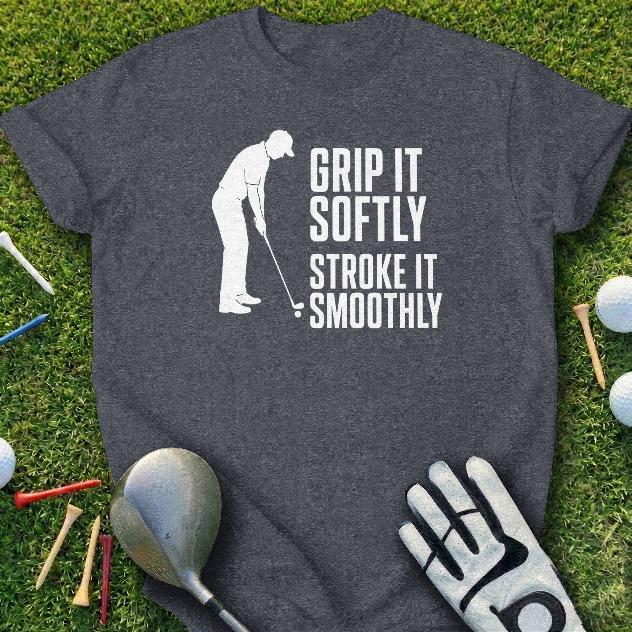 Dark grey t-shirt with white text "GRIP IT SOFTLY STROKE IT SMOOTHLY" and a golfer silhouette.