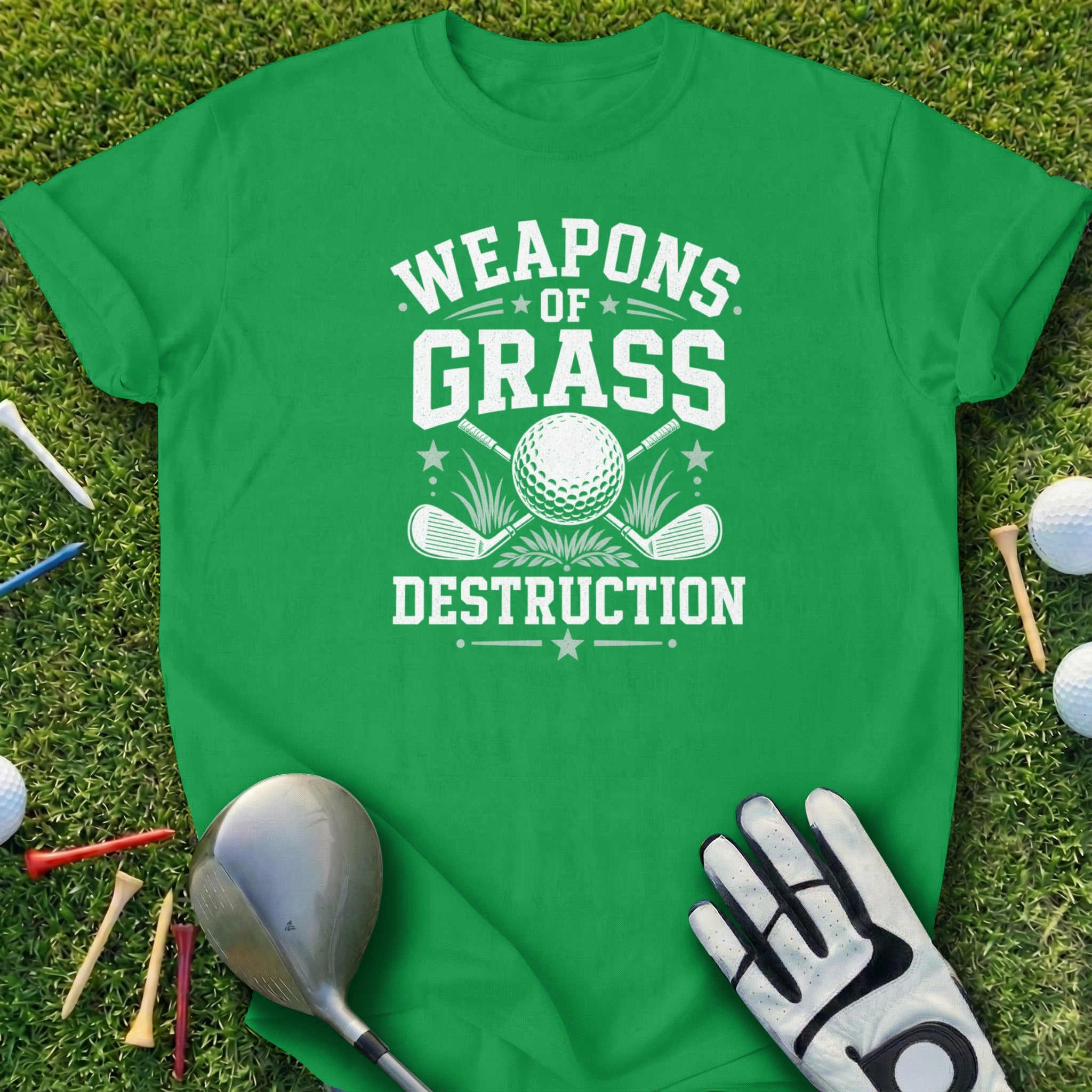 Green t-shirt with "Weapons of Grass Destruction" text and golf club graphics.