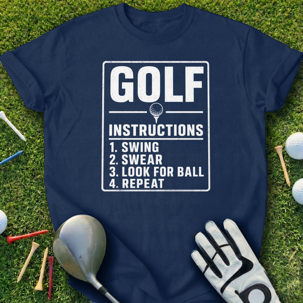 Navy t-shirt with "GOLF INSTRUCTIONS 1. SWING 2. SWEAR 3. LOOK FOR BALL 4. REPEAT"