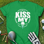 Green t-shirt with "KISS MY" and a golf ball on a tee graphic.