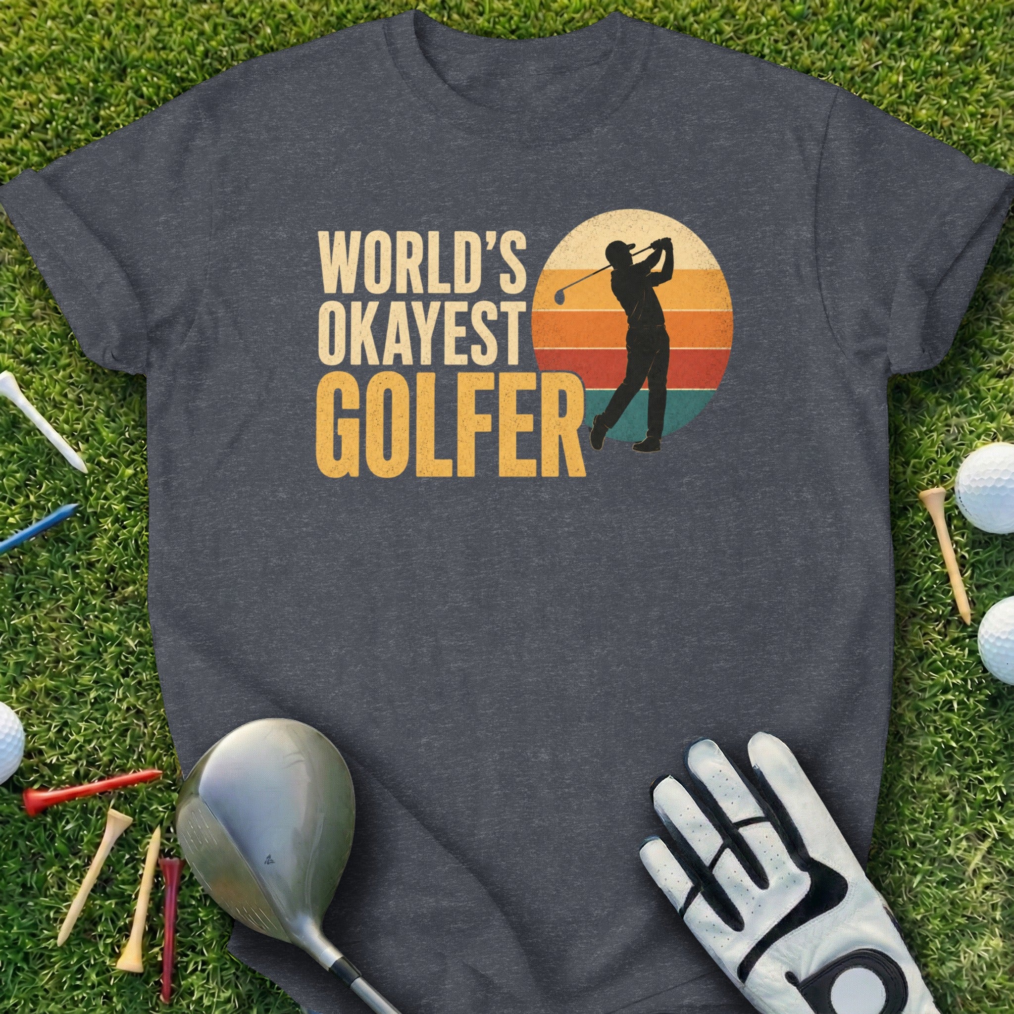Dark grey t-shirt with "World's Okayest Golfer" text and golfer silhouette.