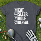 Dark gray t-shirt with "Eat. Sleep. Golf. Repeat." text and golf equipment.