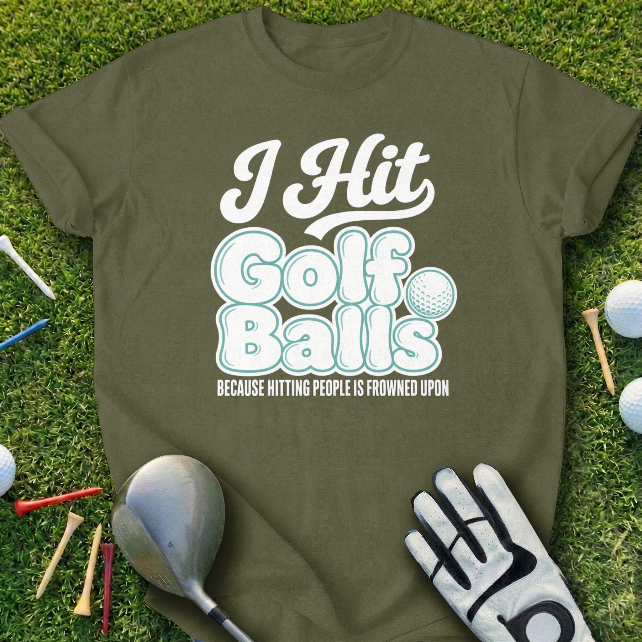 Olive green t-shirt with "I Hit Golf Balls Because Hitting People Is Frowned Upon" graphic.