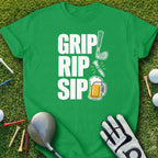 Green t-shirt with "GRIP RIP SIP" text, golf club, knife, and beer mug graphic.