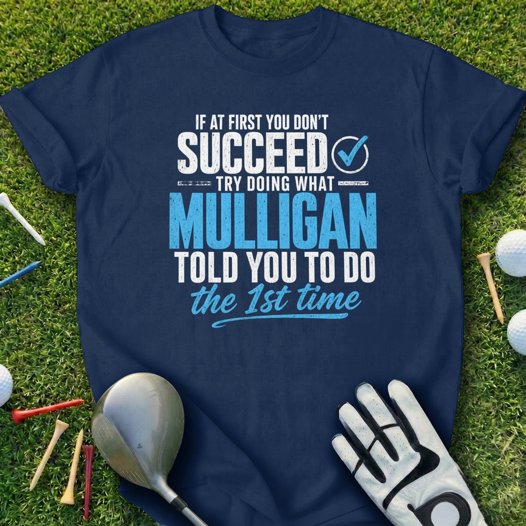 Navy t-shirt with white text about succeeding on the first try with Mulligan.