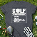 Dark grey t-shirt with white text: GOLF INSTRUCTIONS, 1. SWING, 2. SWEAR, 3. LOOK FOR BALL, 4. REPEAT.