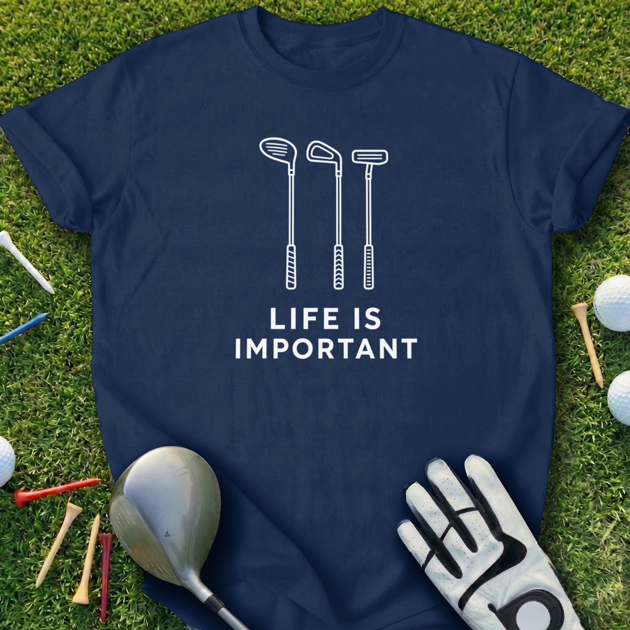 Navy t-shirt with golf club silhouettes and "Life is Important" text.