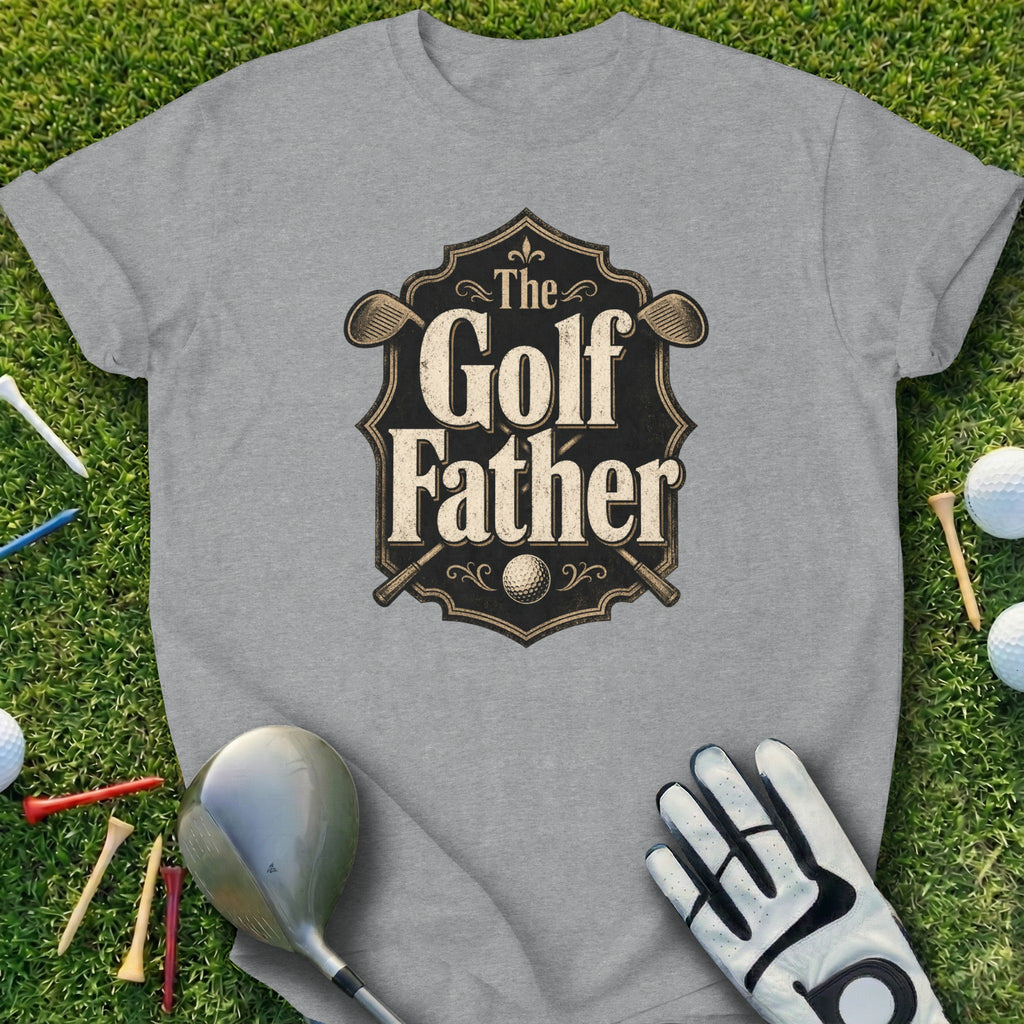 Grey t-shirt with "The Golf Father" text and crossed golf clubs design.