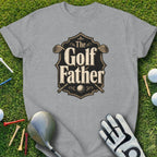 Grey t-shirt with "The Golf Father" text and crossed golf clubs design.