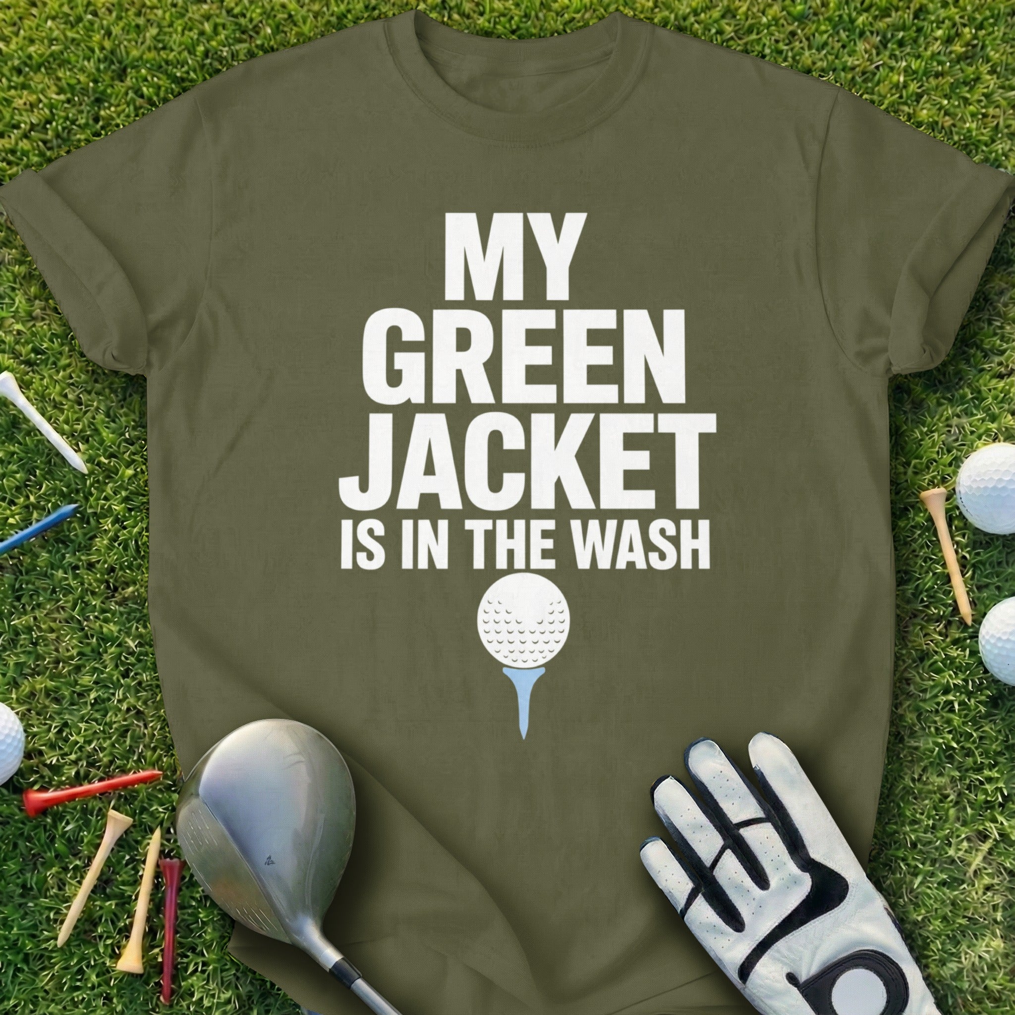 Olive green t-shirt with white text "MY GREEN JACKET IS IN THE WASH"