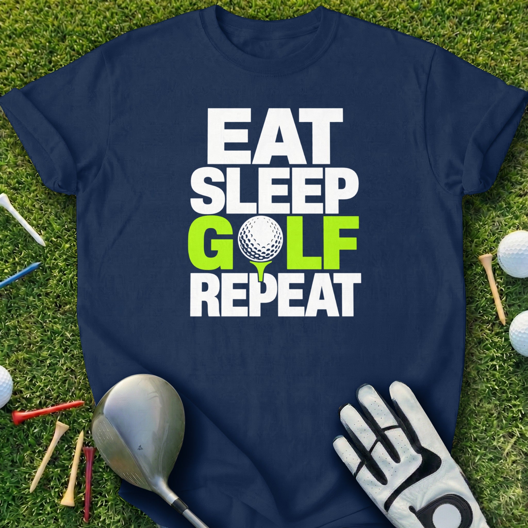 Navy t-shirt with "EAT SLEEP GOLF REPEAT" text and golf equipment.