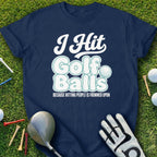 Navy t-shirt with "I Hit Golf Balls Because Hitting People Is Frowned Upon" text.