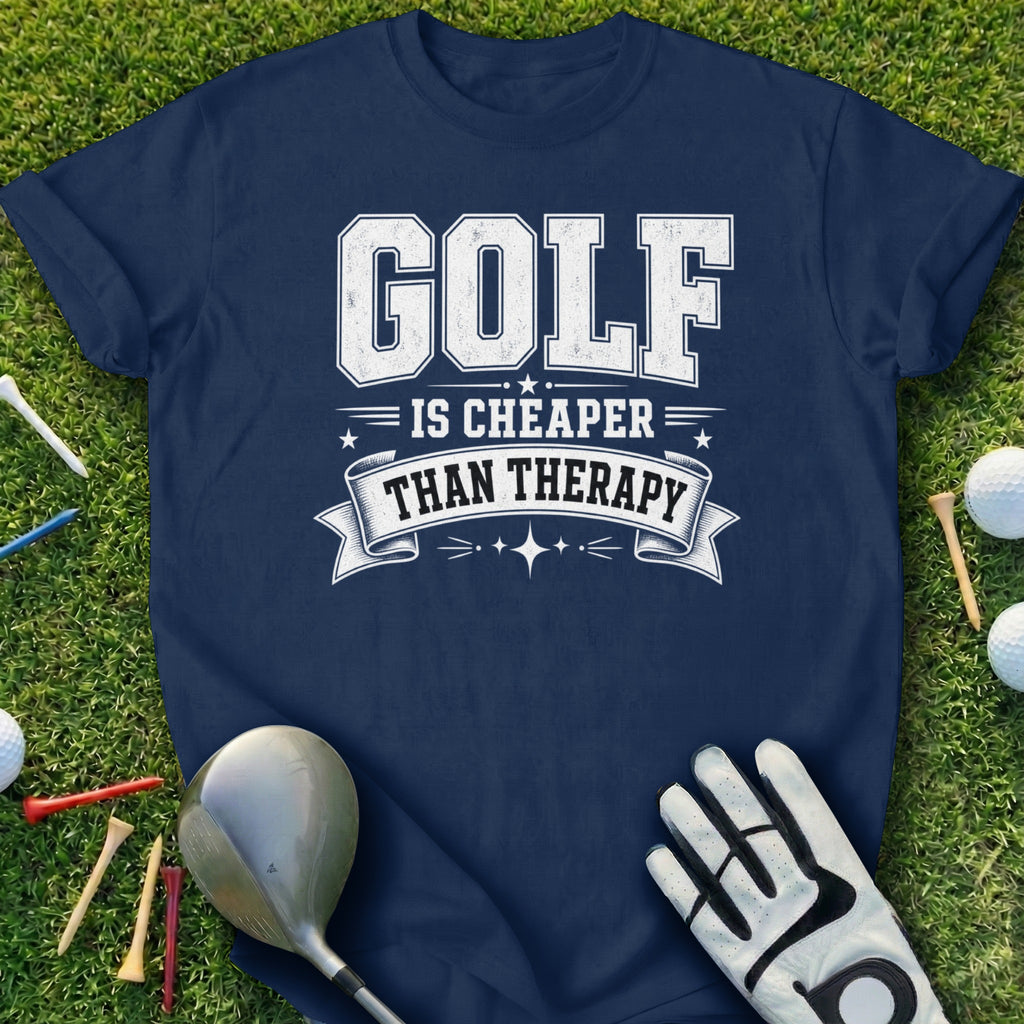Navy t-shirt with "Golf Is Cheaper Than Therapy" text, golf clubs, tees, and balls.