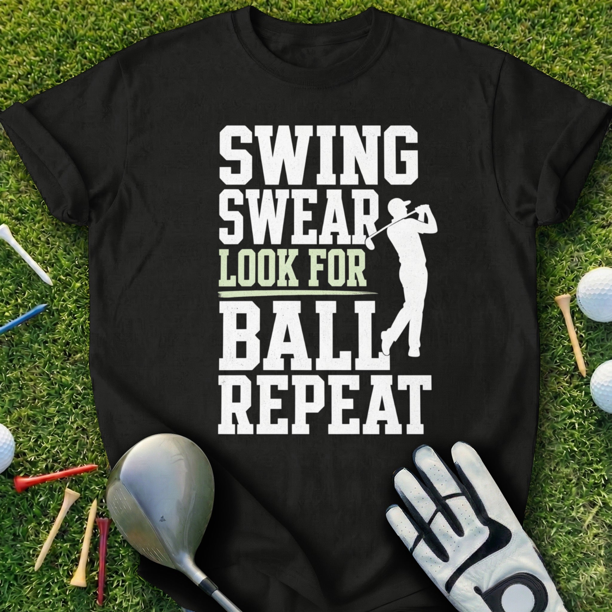 Black t-shirt with "SWING SWEAR LOOK FOR BALL REPEAT" and a golfer graphic.