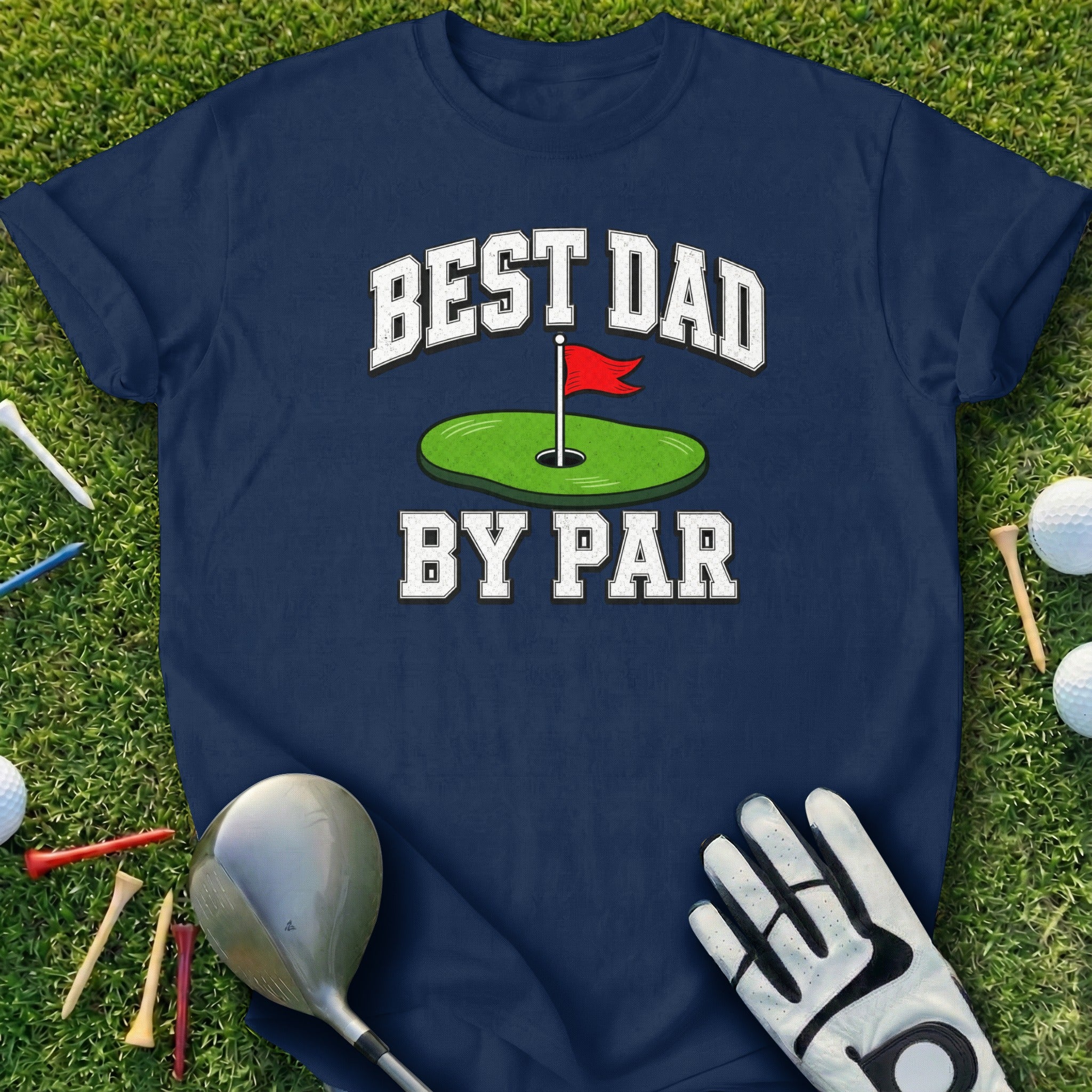 Navy t-shirt with "Best Dad By Par" text, golf club, glove, and balls.