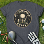 T-shirt with "Mulligan Monday Expert" text, golf ball, club, tee, and glove.